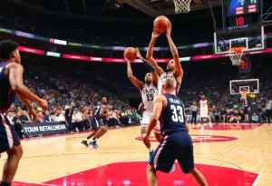 Creighton University basketball team in action during the exhibition game against Iowa State.