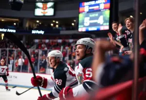 Hockey players celebrating after a win at Baxter Arena