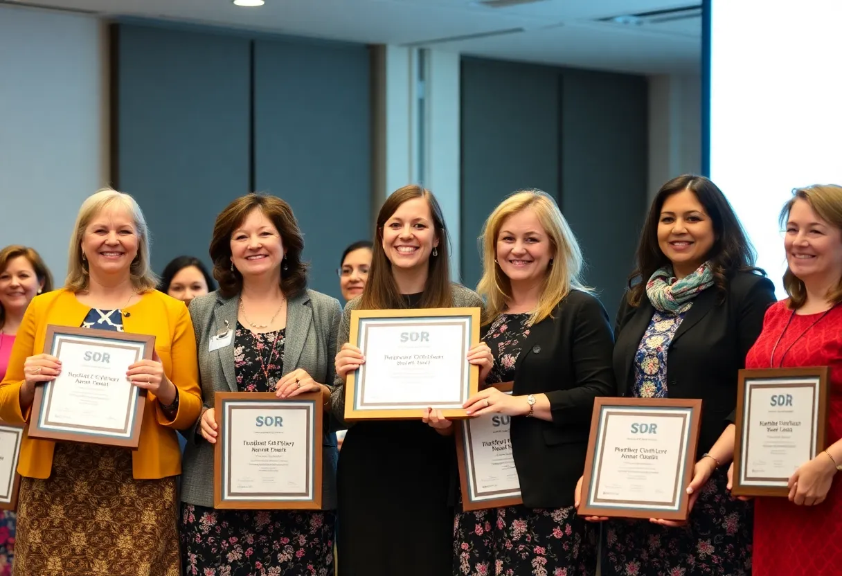 Educators celebrating their awards at the UNO dual enrollment recognition ceremony